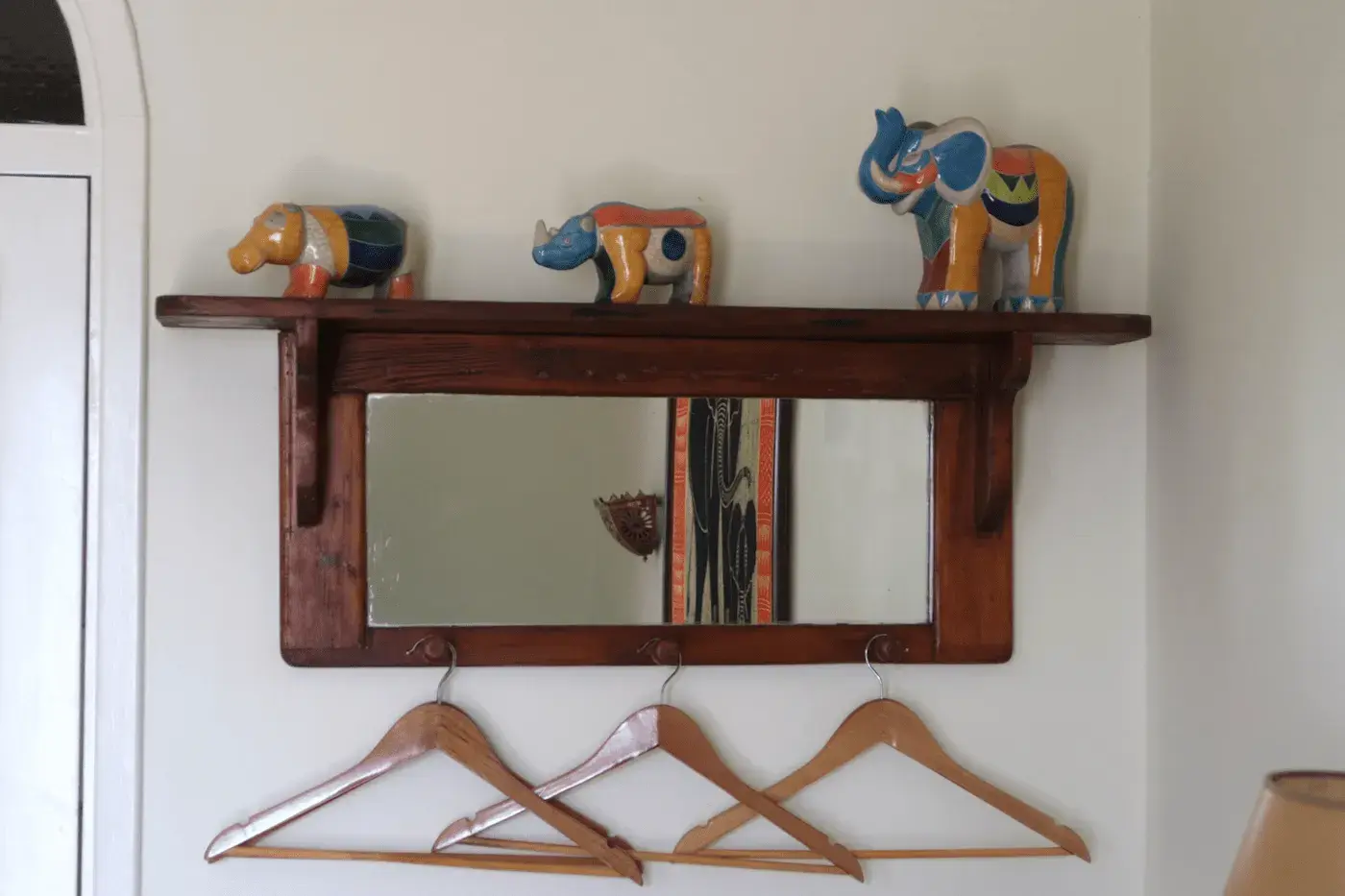Decorative elephant shelf in the hallway of Kasbah Rose guesthouse, showcasing traditional Moroccan craftsmanship and adding authentic charm to the interior design