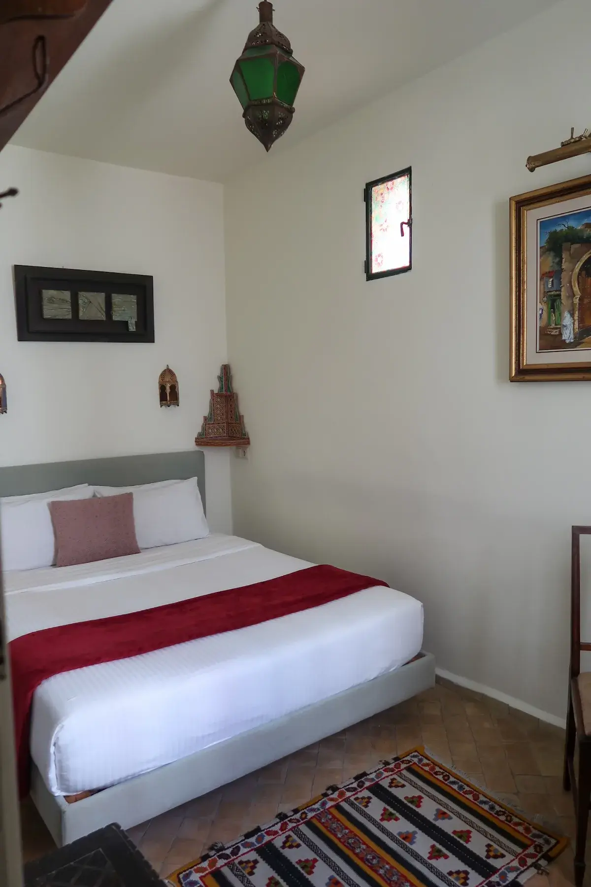 Comfortable double bed with two pillows in the double room at Kasbah Rose