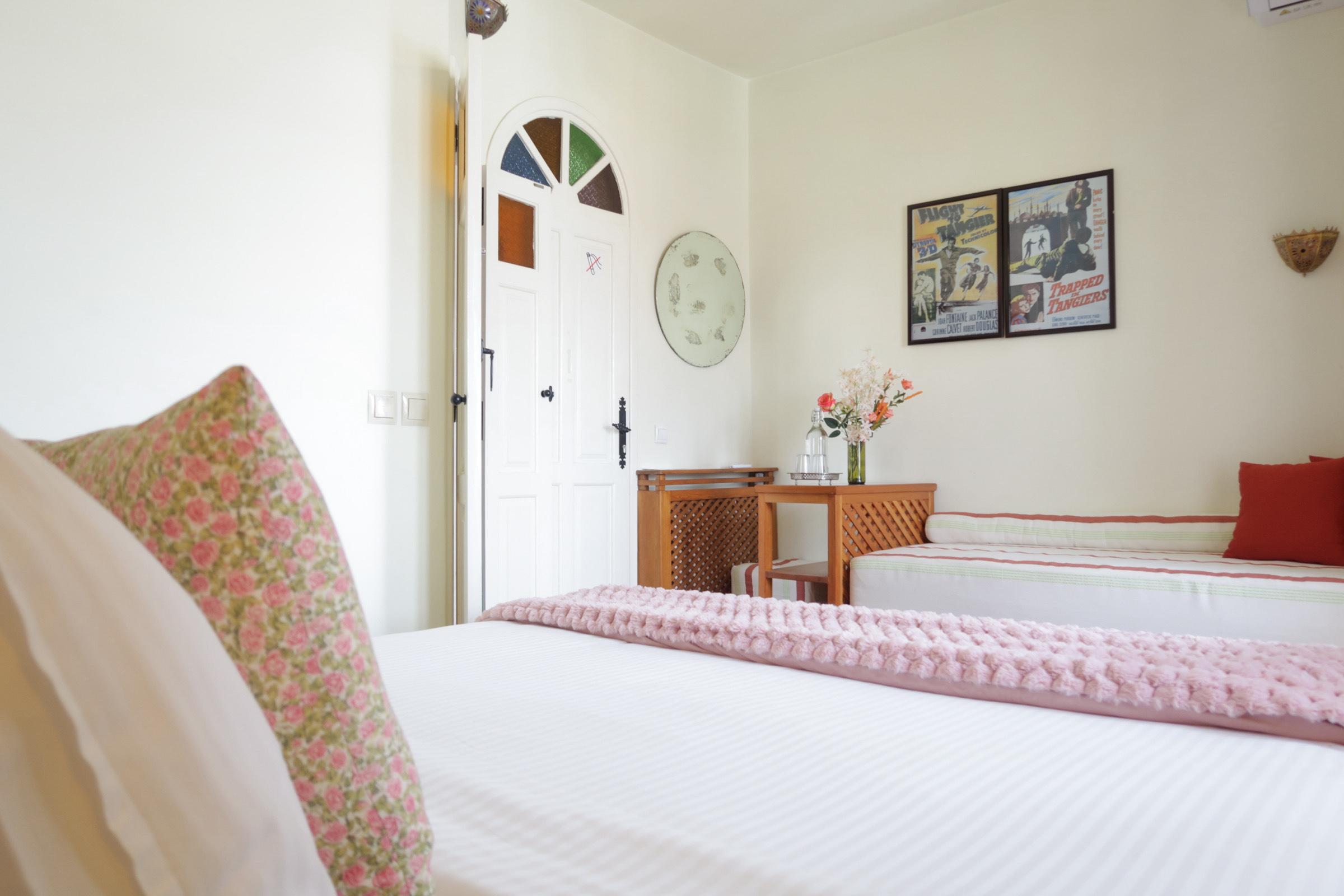 Comfortable double bed in the junior suite at Kasbah Rose