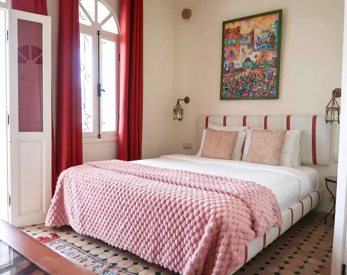 Comfortable double bed in the junior suite at Kasbah Rose